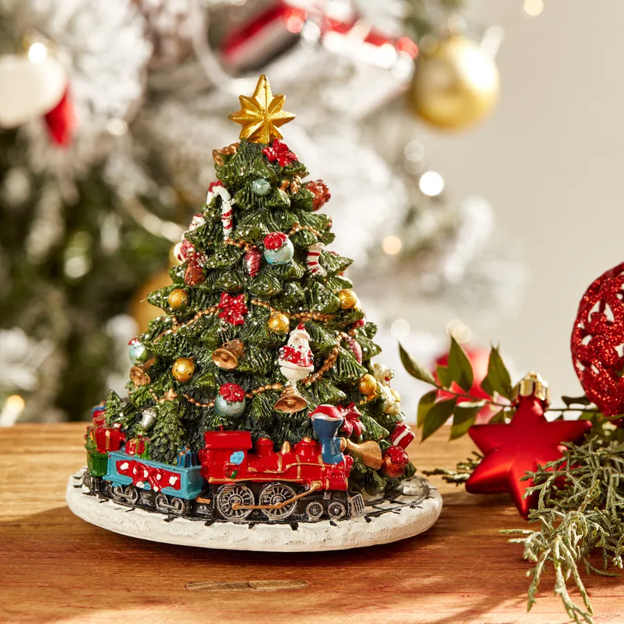 Musical christmas tree with hot sale train